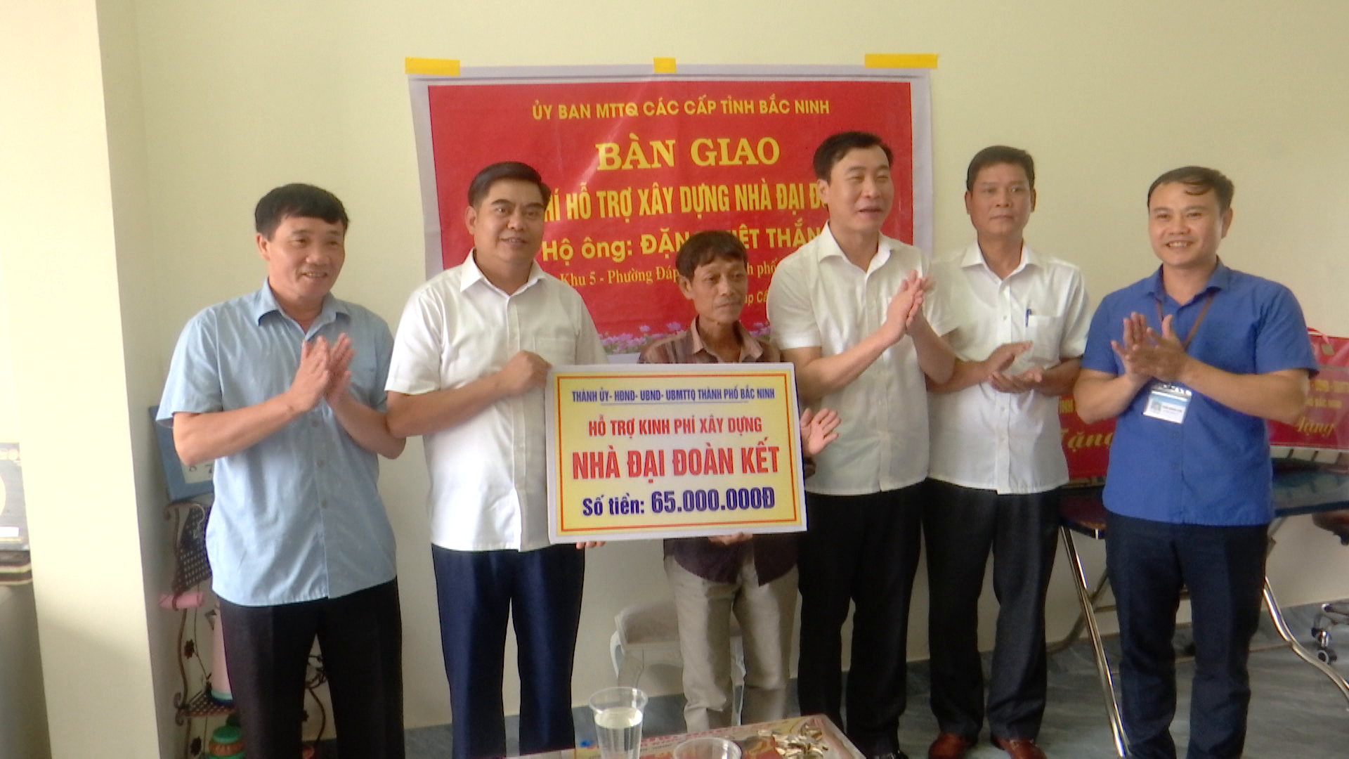 ban_giao_nha_dai_doan_ket(1)